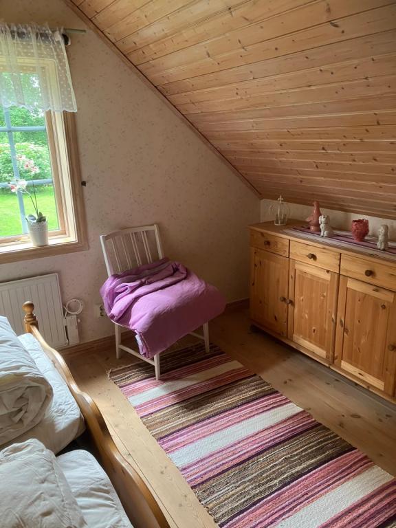 Postel nebo postele na pokoji v ubytování Kroppkakan