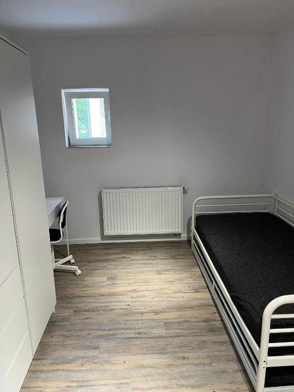 Postel nebo postele na pokoji v ubytování Apartamenty Kowary Centrum