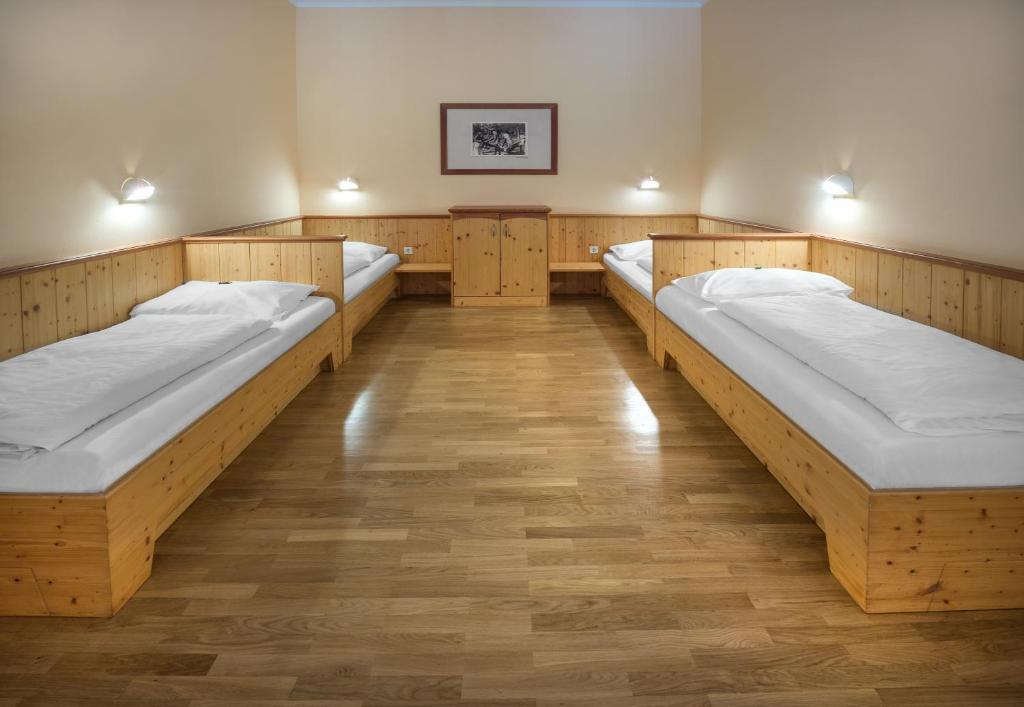 Postel nebo postele na pokoji v ubytování JUFA Hotel Gitschtal