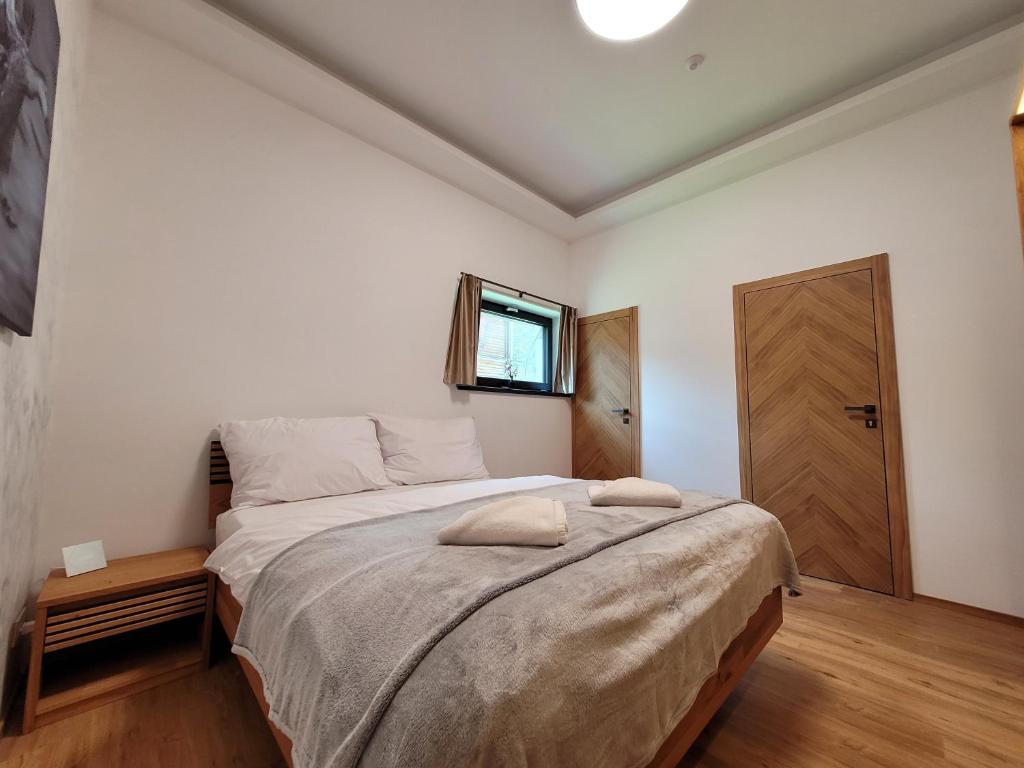 Postel nebo postele na pokoji v ubytování 1 CHALET SPA & WELLNESS - Jasná Center