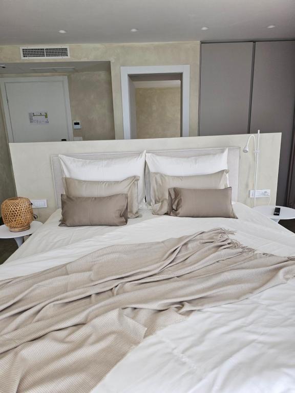 Postel nebo postele na pokoji v ubytování Hotel Aria