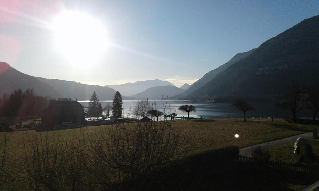 a view of a lake with mountains in the background at Fewo Ossiach in Ossiach
