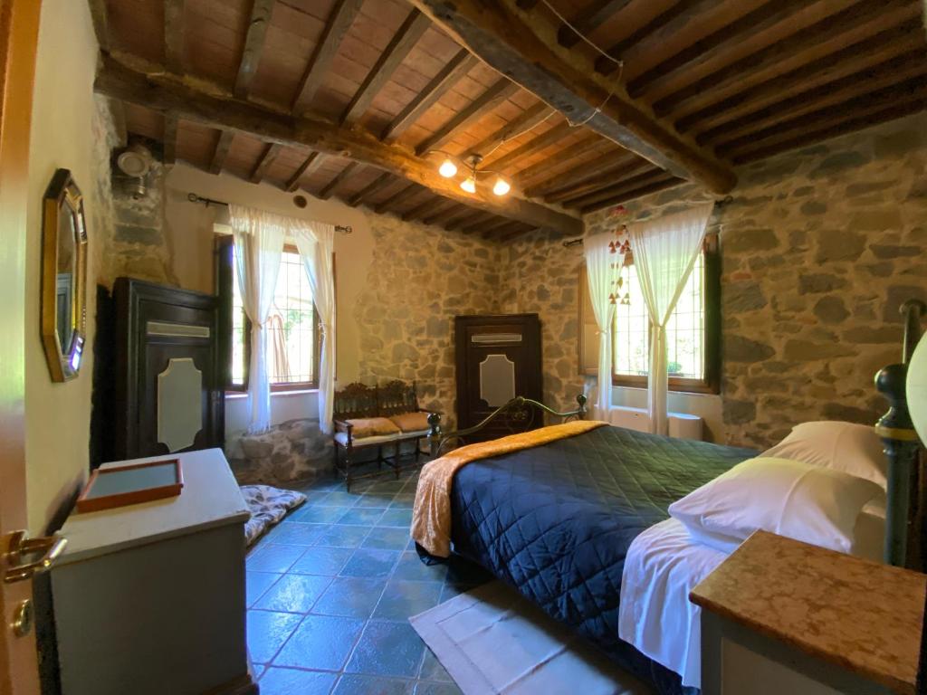 Postel nebo postele na pokoji v ubytování OASI LIGNANA Suite Apartments