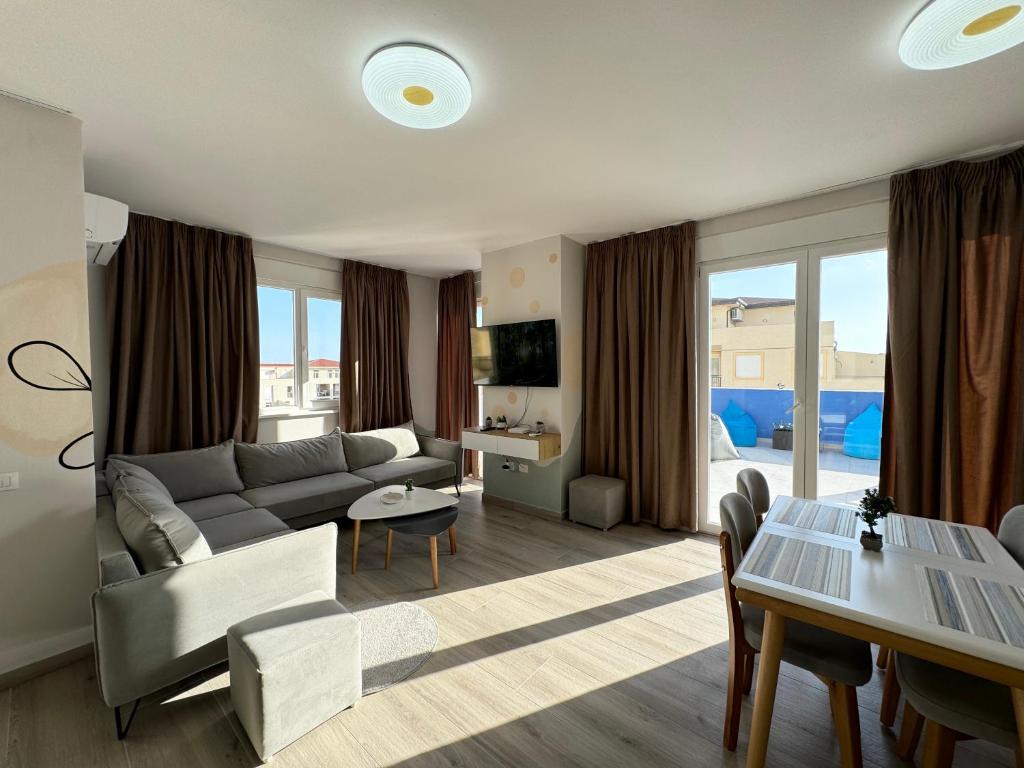Posezení v ubytování R Apartments