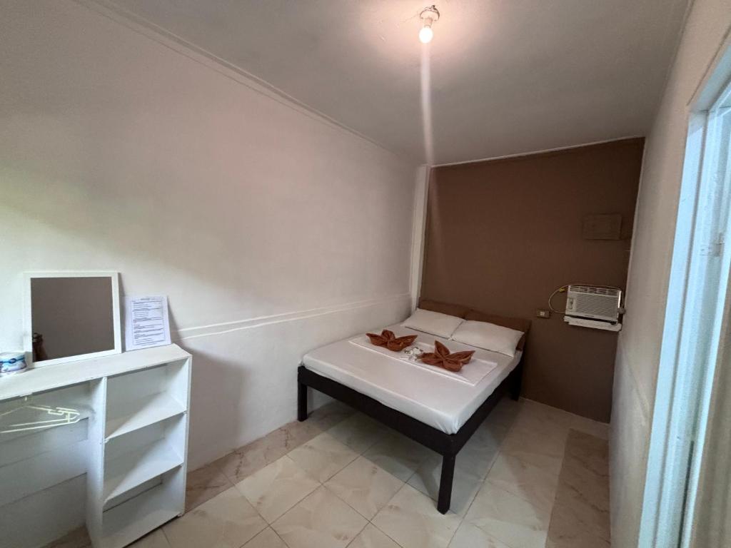 Postel nebo postele na pokoji v ubytování Paradiso Hostel El nido
