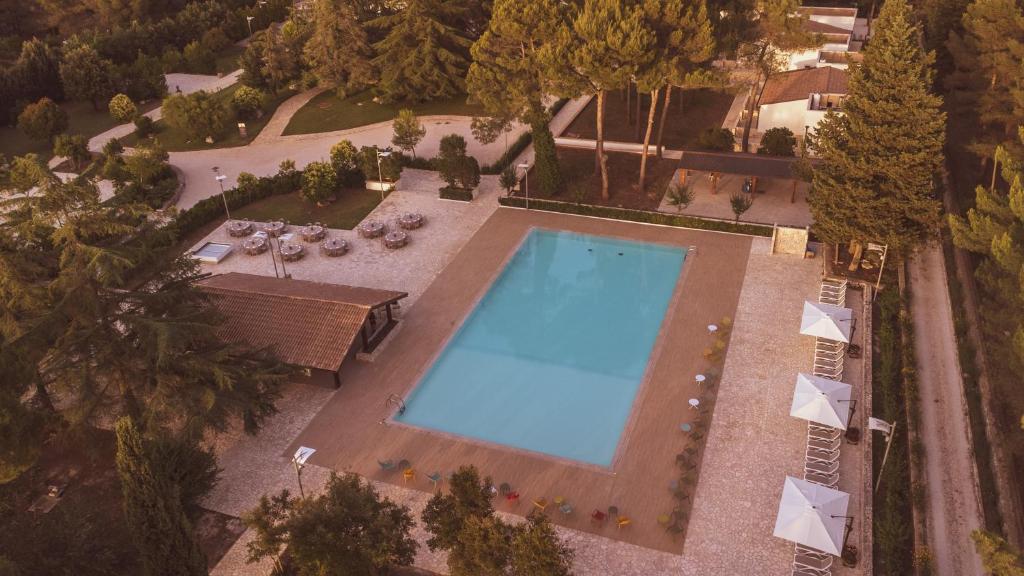 Bazén v ubytování WINE RESORT LE VIGNE AL CASTELLO nebo v jeho okolí