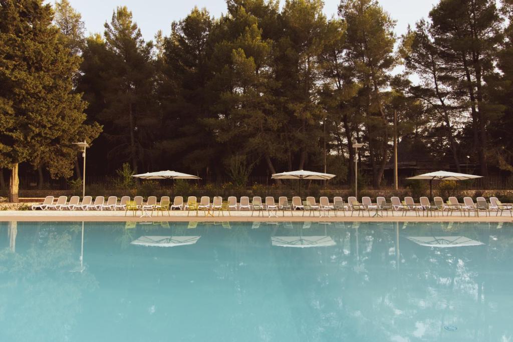 Bazén v ubytování WINE RESORT LE VIGNE AL CASTELLO nebo v jeho okolí