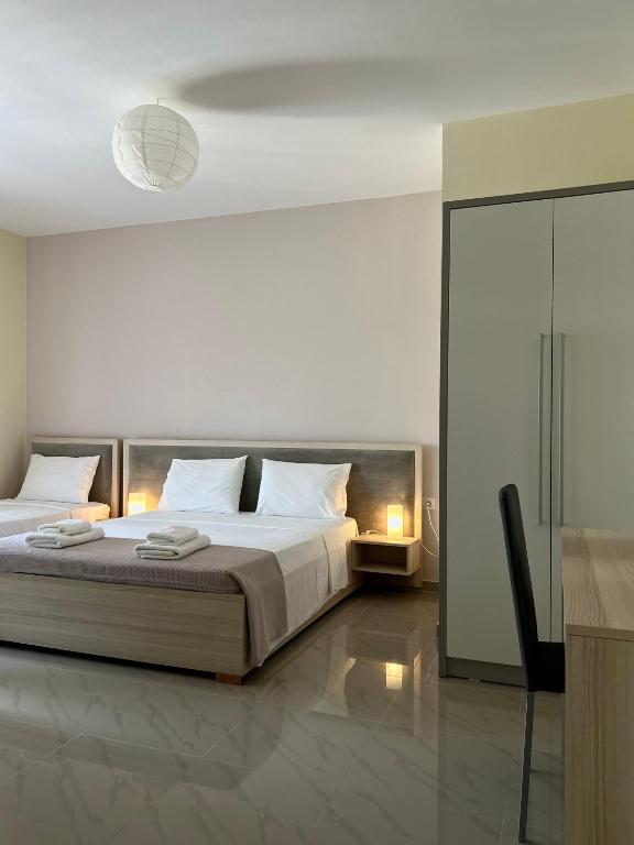 Postel nebo postele na pokoji v ubytování Elizabeth Apartments Himare