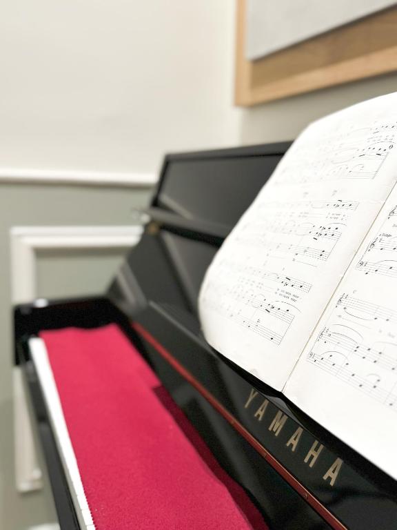 a black box with a sheet of music on top at Hôtel de Provence in Cannes