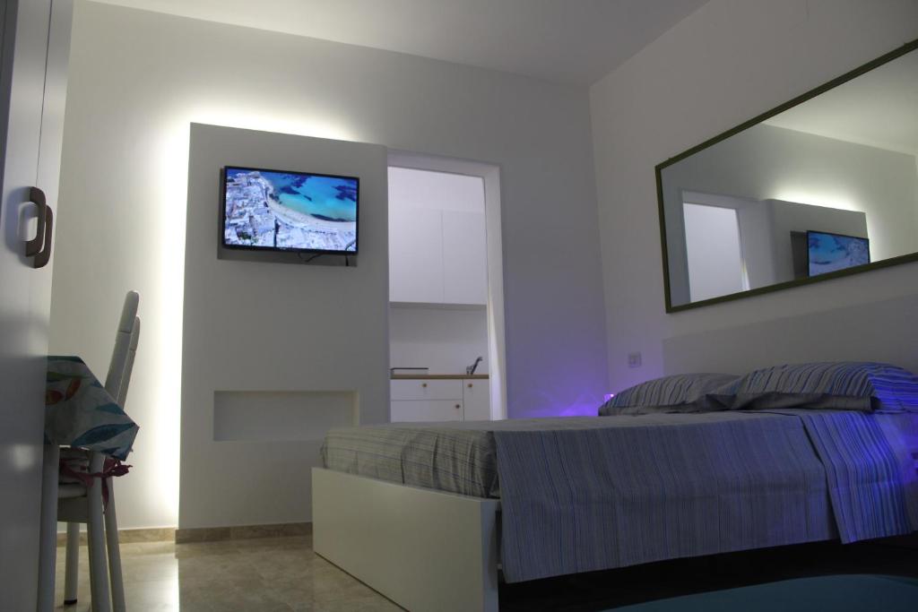 Et tv og/eller underholdning på Eva D'Estate Casa Vacanze Salento