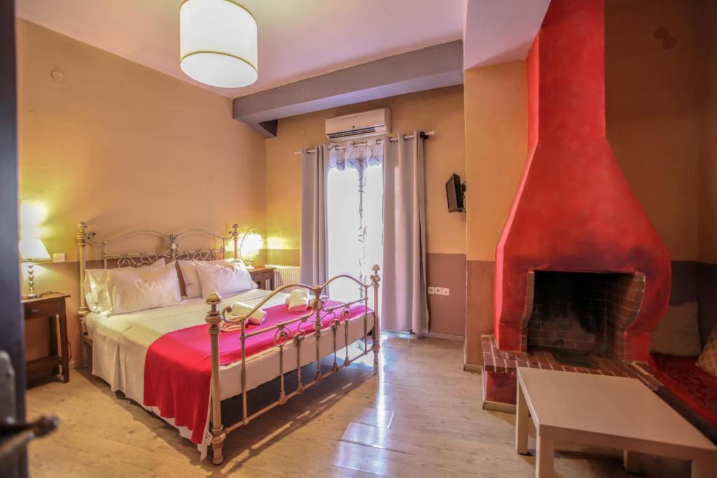 Postel nebo postele na pokoji v ubytování Mythos Guesthouse