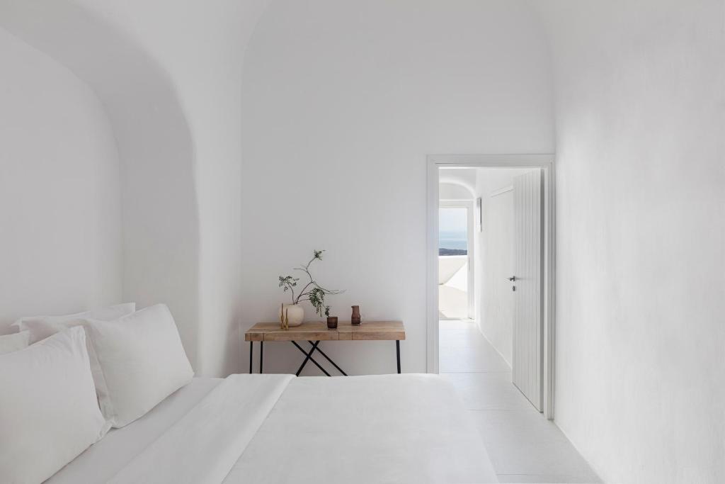 Letto o letti in una camera di CASASUNSHA Hybrid Retreat Santorini