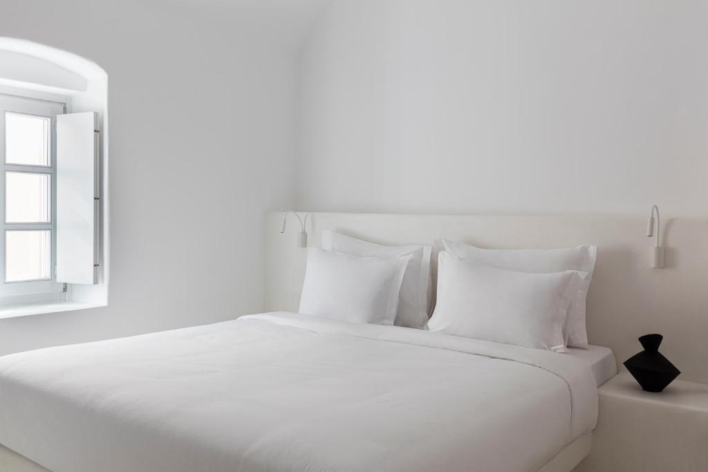 Letto o letti in una camera di CASASUNSHA Hybrid Retreat Santorini
