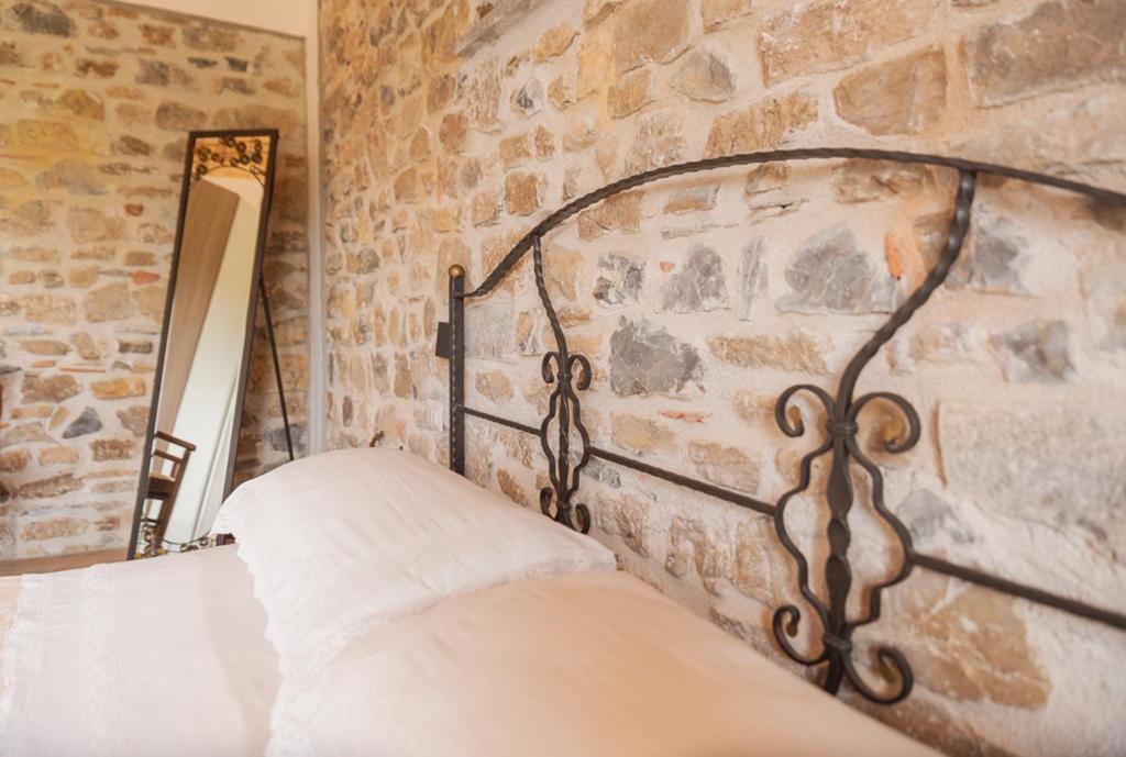 Postel nebo postele na pokoji v ubytování Agriturismo San Basilio