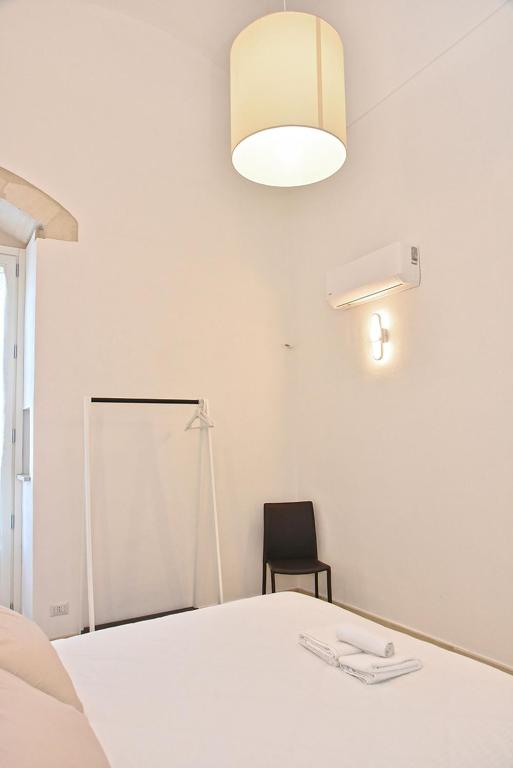 Postel nebo postele na pokoji v ubytování Adhoc Rooms