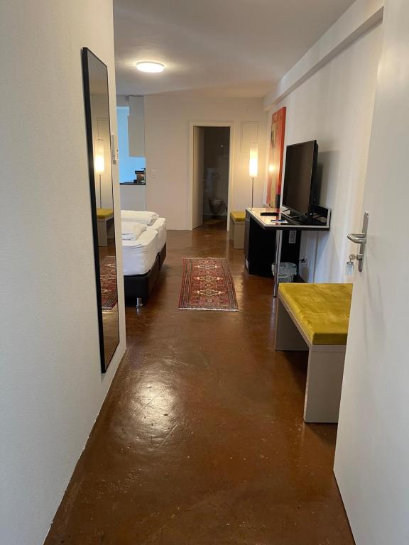 Postel nebo postele na pokoji v ubytování Hotel Swiss Bellevue Aathal
