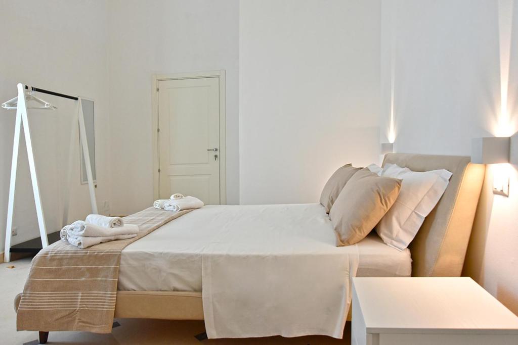Postel nebo postele na pokoji v ubytování Adhoc Rooms