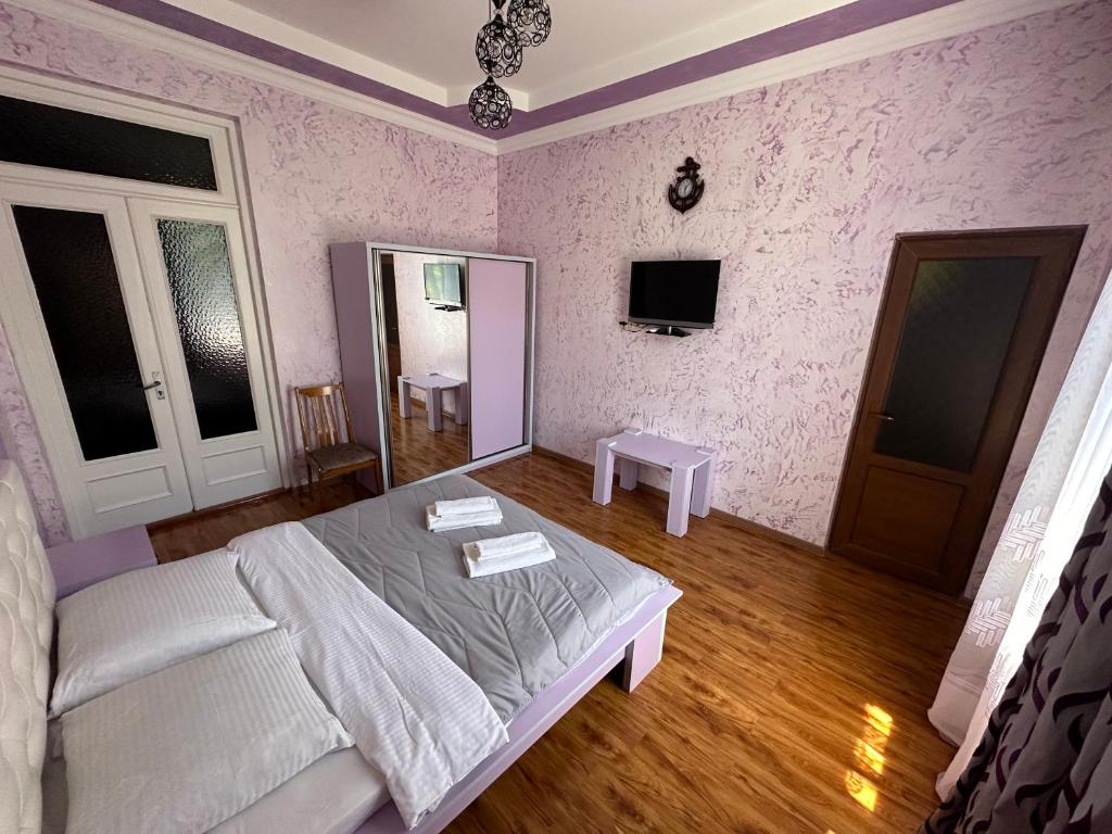 Postel nebo postele na pokoji v ubytování Inga's House