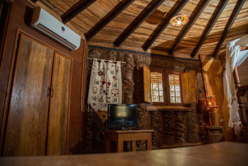 TV a/nebo společenská místnost v ubytování Dar Horchani Tozeur