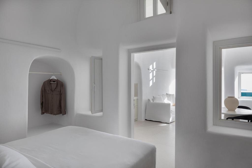 Letto o letti in una camera di CASASUNSHA Hybrid Retreat Santorini