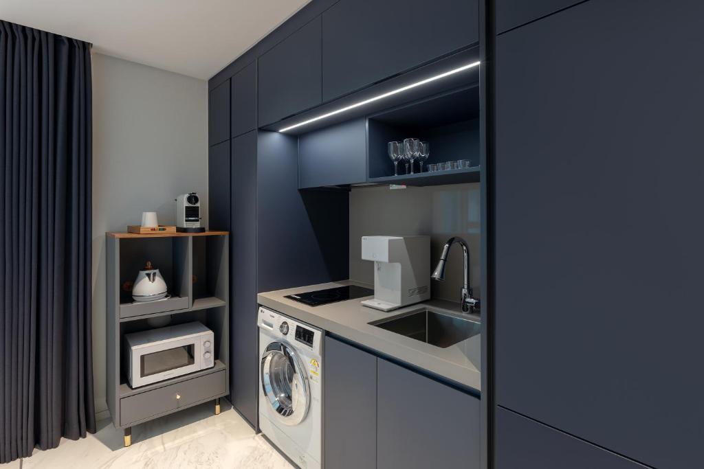 Kuchyň nebo kuchyňský kout v ubytování NewCZ Haeundae Residence