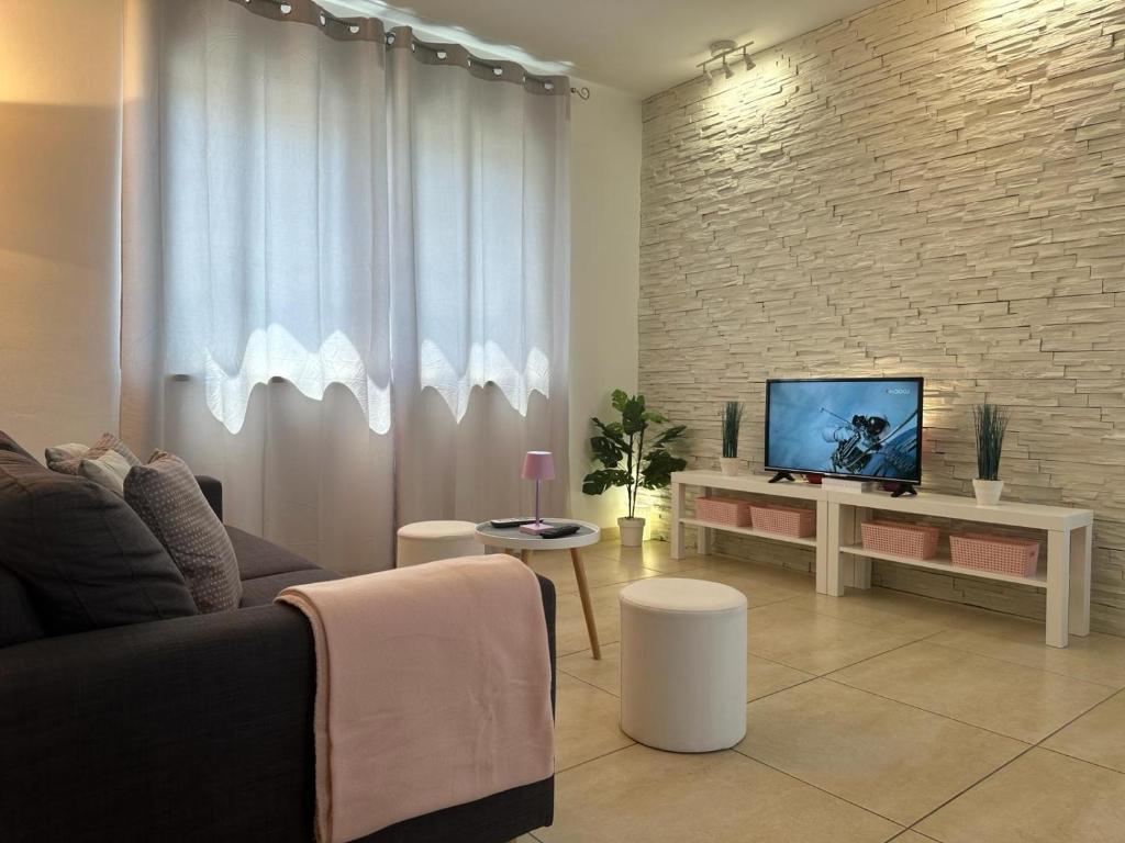 TV a/nebo společenská místnost v ubytování Apartments BRIST HILLS