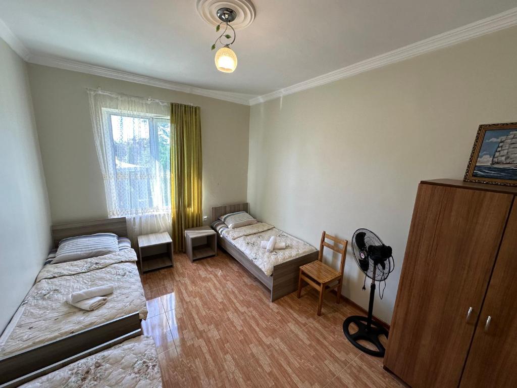 Postel nebo postele na pokoji v ubytování Inga's House