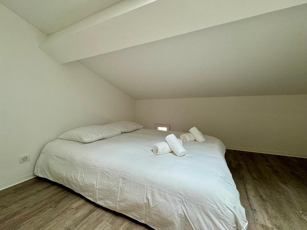 Postel nebo postele na pokoji v ubytování Chambre de charme à Evisa