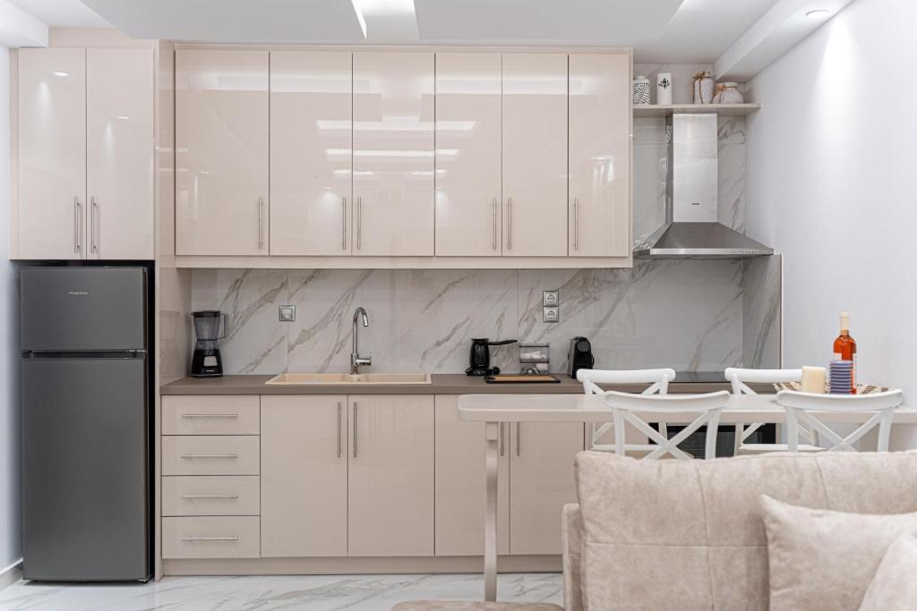 Kuchyň nebo kuchyňský kout v ubytování Meraki Home