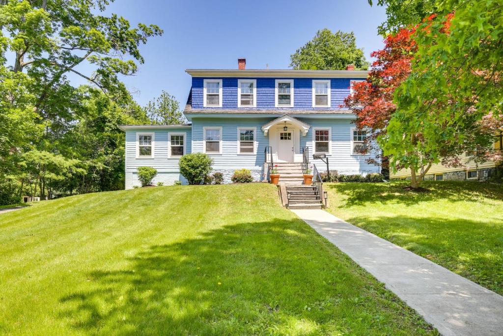 a blue and white house with a large yard at Historic Poughkeepsie Home Near Arlington & Vassar in Poughkeepsie