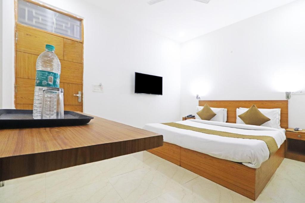Postel nebo postele na pokoji v ubytování Hotel Trendy Residency - Couple Friendly Hotel