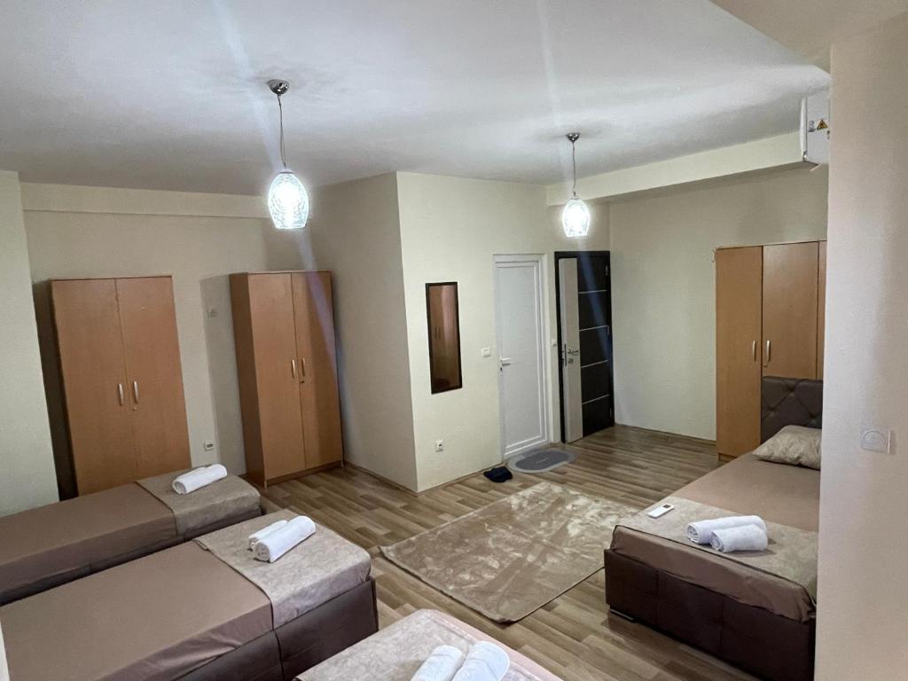 Postel nebo postele na pokoji v ubytování Hotel Balkan