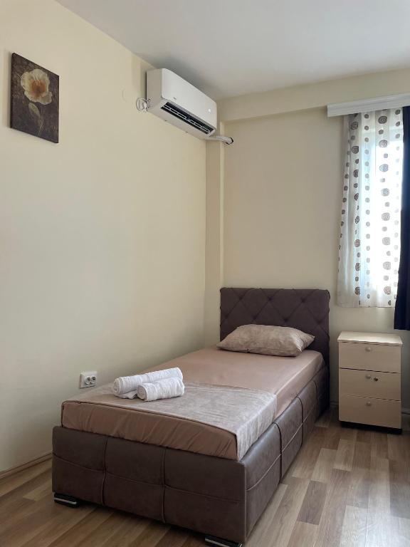 Postel nebo postele na pokoji v ubytování Hotel Balkan