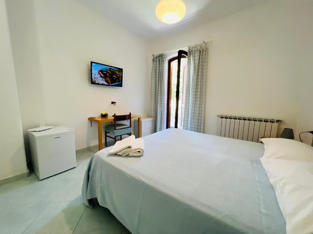 Postel nebo postele na pokoji v ubytování Villa Thomas BB conduzione familiare