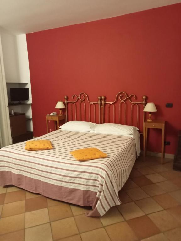 Postel nebo postele na pokoji v ubytování Albergo Boutique Casajanca