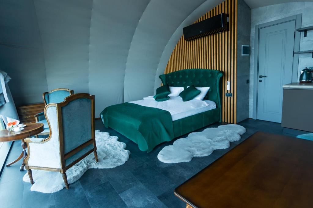 Postel nebo postele na pokoji v ubytování Moncastro Glamping