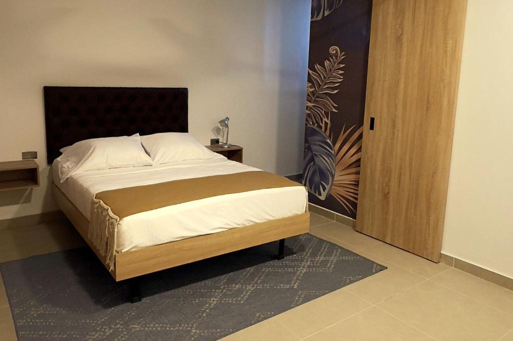 Postel nebo postele na pokoji v ubytování Star AV 37 HOTEL