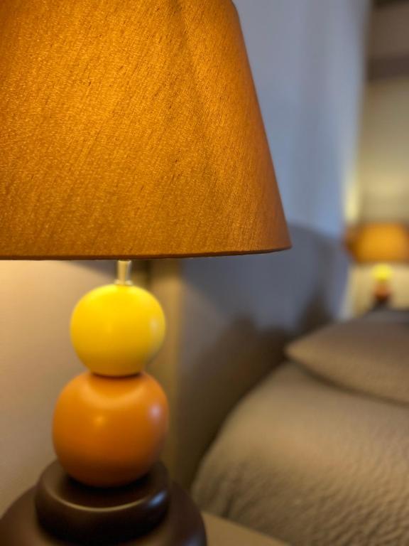 Letto o letti in una camera di Hotel Fleur de Lys
