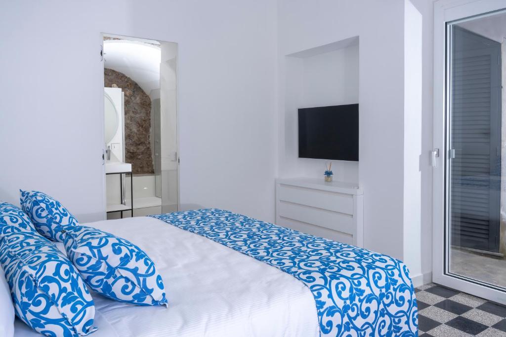 Postel nebo postele na pokoji v ubytování Villa L'Ara