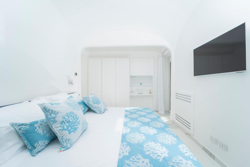 Postel nebo postele na pokoji v ubytování Villa L'Ara