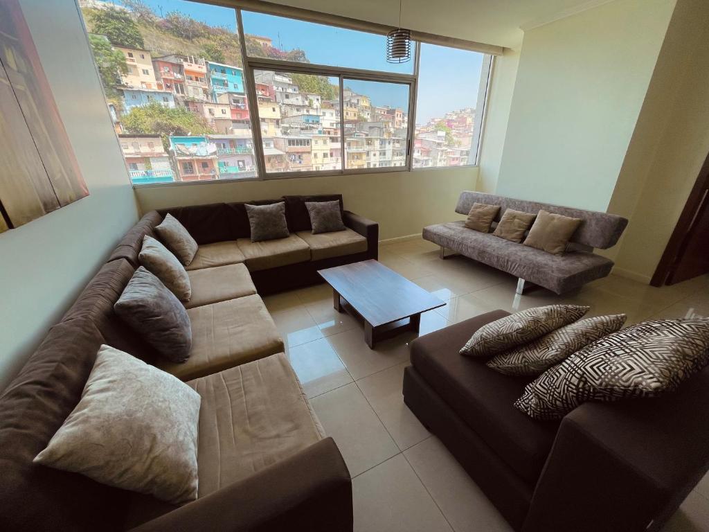 Khu vực ghế ngồi tại Suite Riverfront Puerto Santa Ana