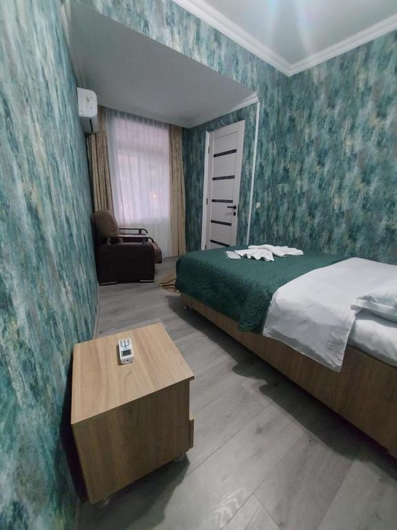 Postel nebo postele na pokoji v ubytování Hotel Rabat Castle