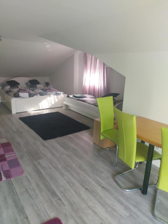 Postel nebo postele na pokoji v ubytování Rena Vendégház
