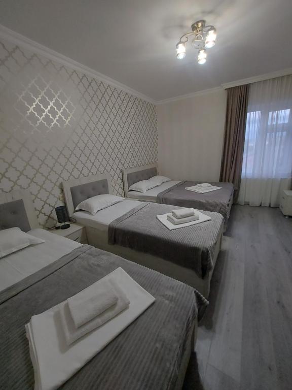 Postel nebo postele na pokoji v ubytování Hotel Rabat Castle
