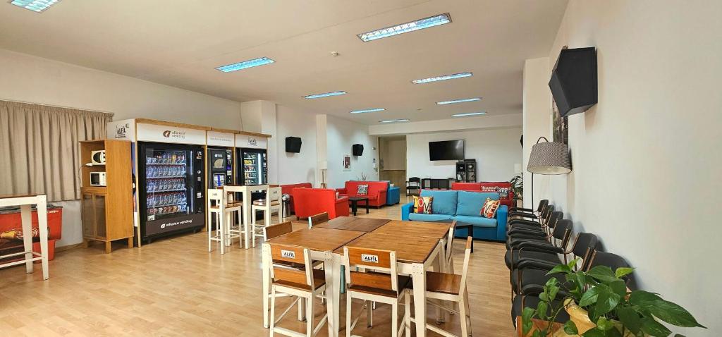 TV a/nebo společenská místnost v ubytování Hostel Residencia Alfil