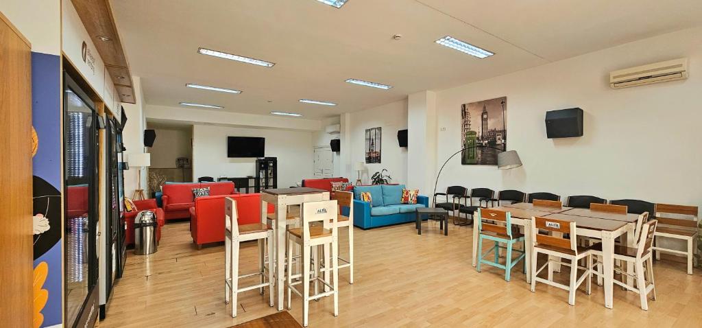 TV a/nebo společenská místnost v ubytování Hostel Residencia Alfil