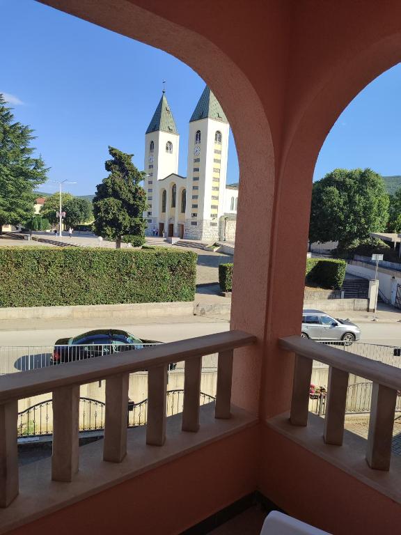 a view of a building from a balcony at Rooms Zdravko and Nevenka Cilic in Međugorje
