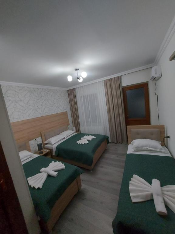Postel nebo postele na pokoji v ubytování Hotel Rabat Castle
