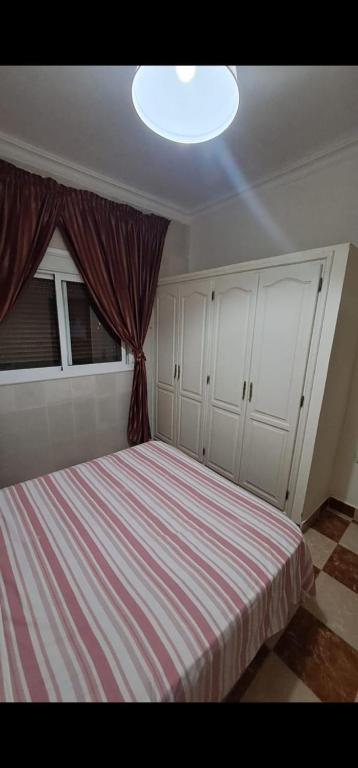Postel nebo postele na pokoji v ubytování Sidi Soulaimane
