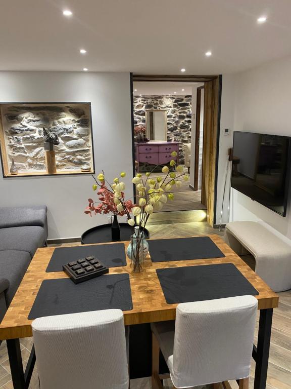 TV a/nebo společenská místnost v ubytování l atelier